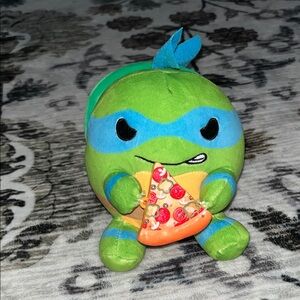 Green and Blue Ninja Turtle Plush with Pizza